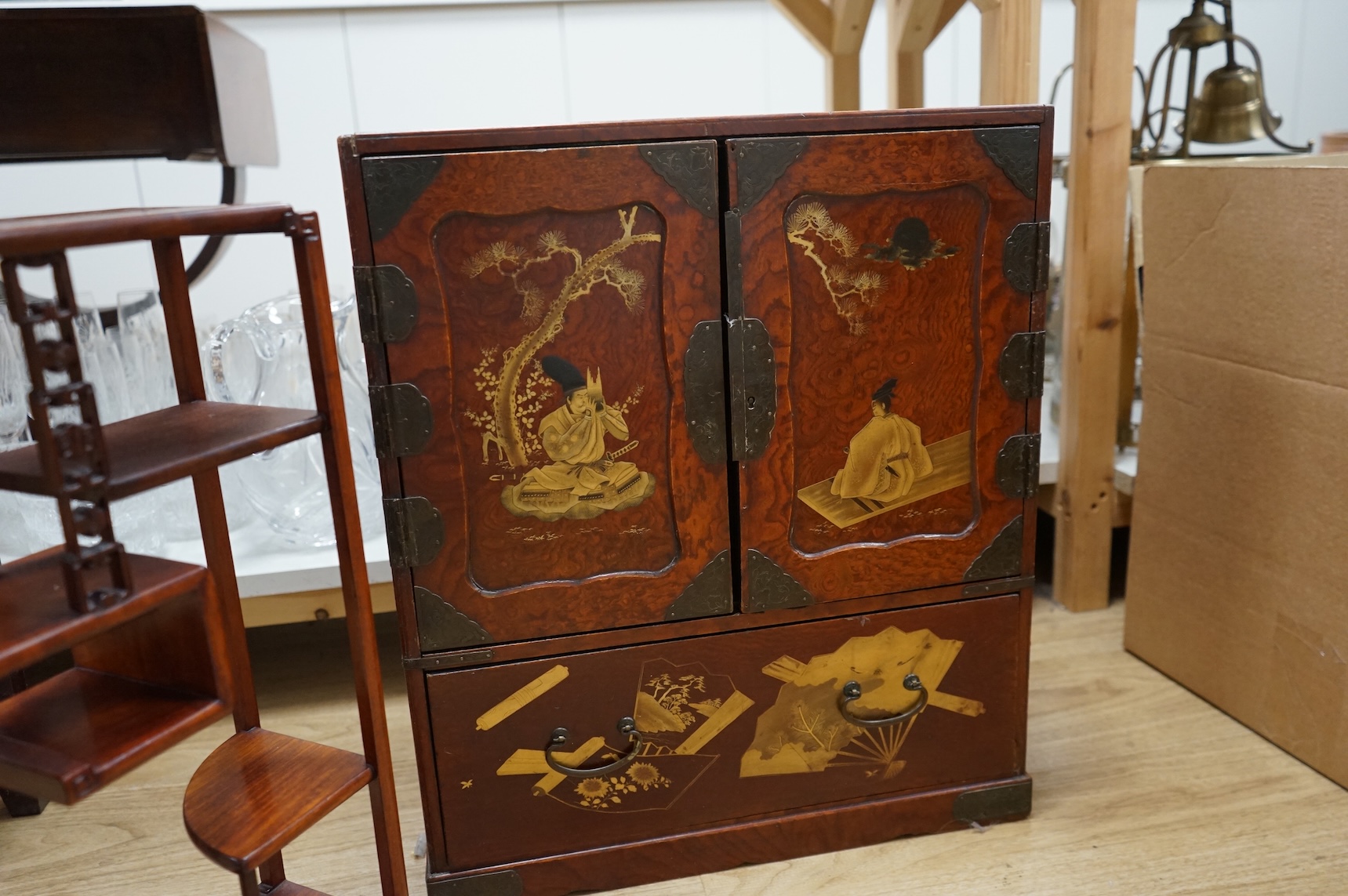 A Japanese lacquered table cabinet and shelves, largest 53.5 x 45cm